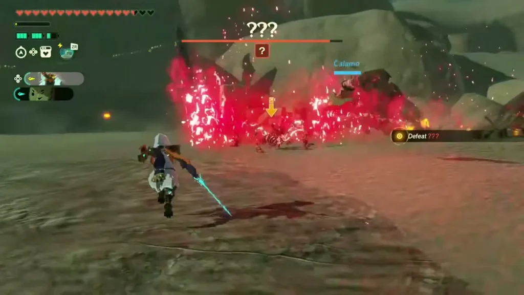 The corrupted construct rushes across the sand wrapped in a wall of red Malice
