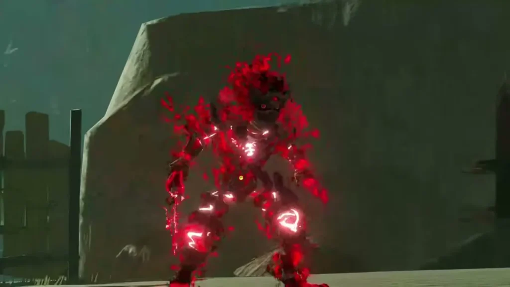 The corrupted construct glows red with Malice in front of a stone wall