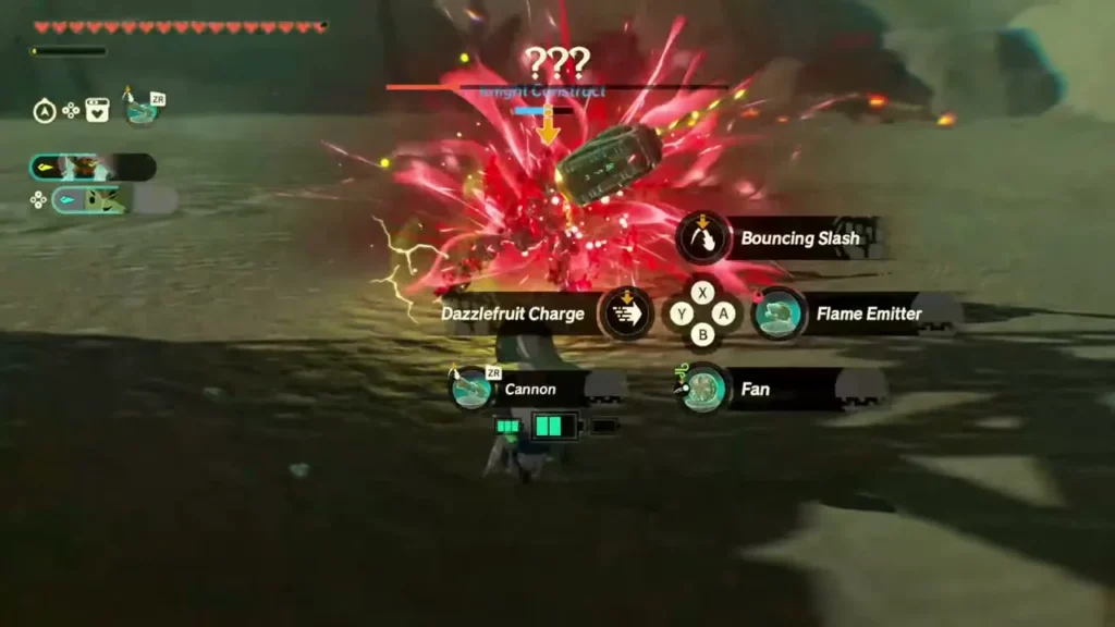 A Cannon blast hits the red Construct while Fan and Flame Emitter sit on the device wheel