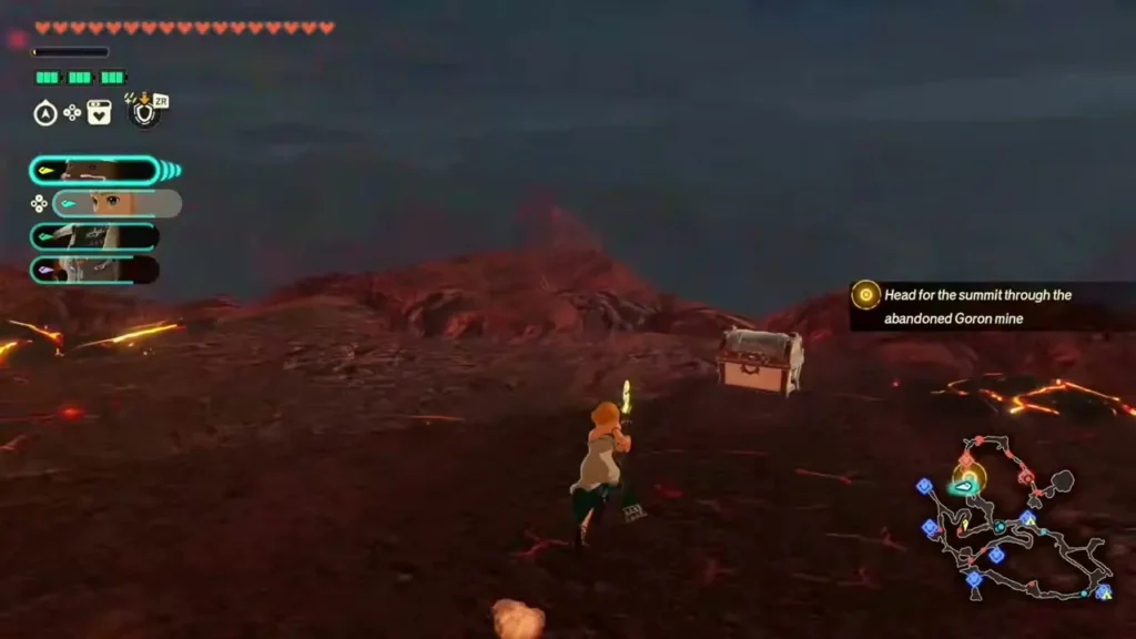 A treasure chest sits on open ground ahead of Zelda