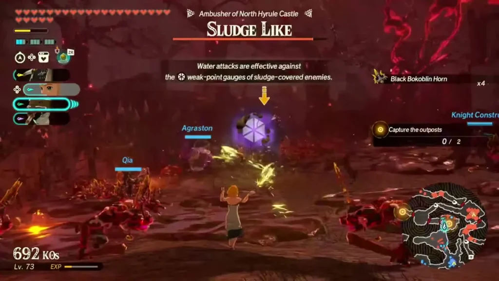 Zelda faces a Sludge Like while the game explains that water attacks work on sludge-covered enemies Zelda faces a Sludge Like while the game explains that water attacks work on sludge-covered enemies