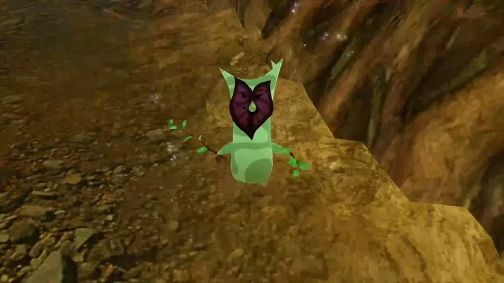 A Korok with a dark heart-shaped face pops out beside a rocky outcrop A Korok with a dark heart-shaped face pops out beside a rocky outcrop
