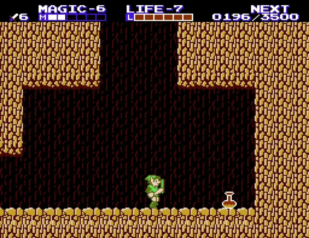 Link in the brown-orange cave on Maze Island, with a flask-shaped item on the floor to the right Link in the brown-orange cave on Maze Island, with a flask-shaped item on the floor to the right