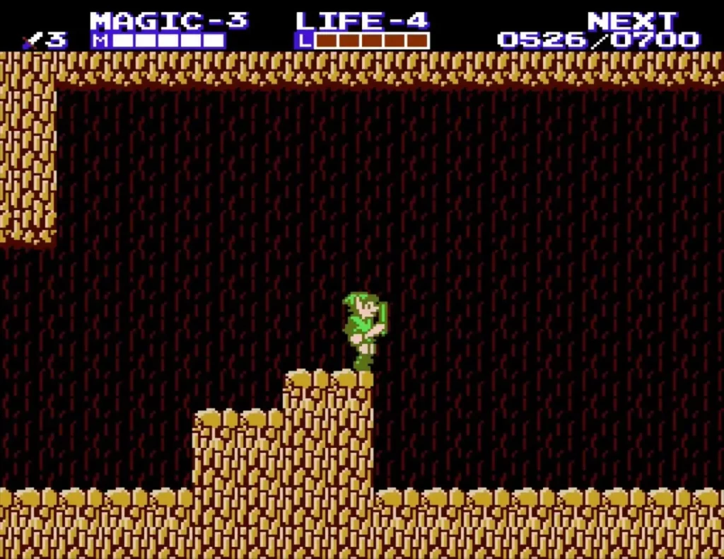 Link standing on a rock ledge inside the brown rock cave on Death Mountain Link standing on a rock ledge inside the brown rock cave on Death Mountain
