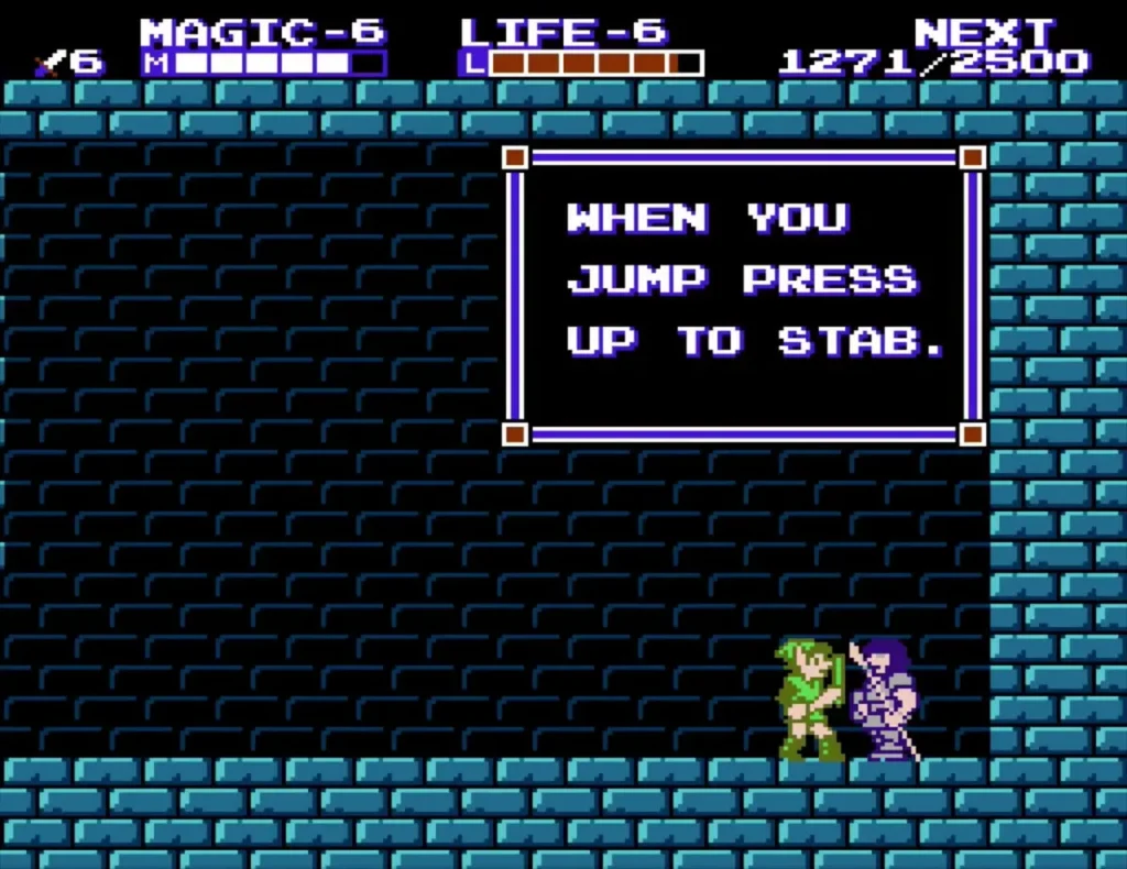 Knight in a blue-brick room with the box saying to jump and press Up to stab Knight in a blue-brick room with the box saying to jump and press Up to stab