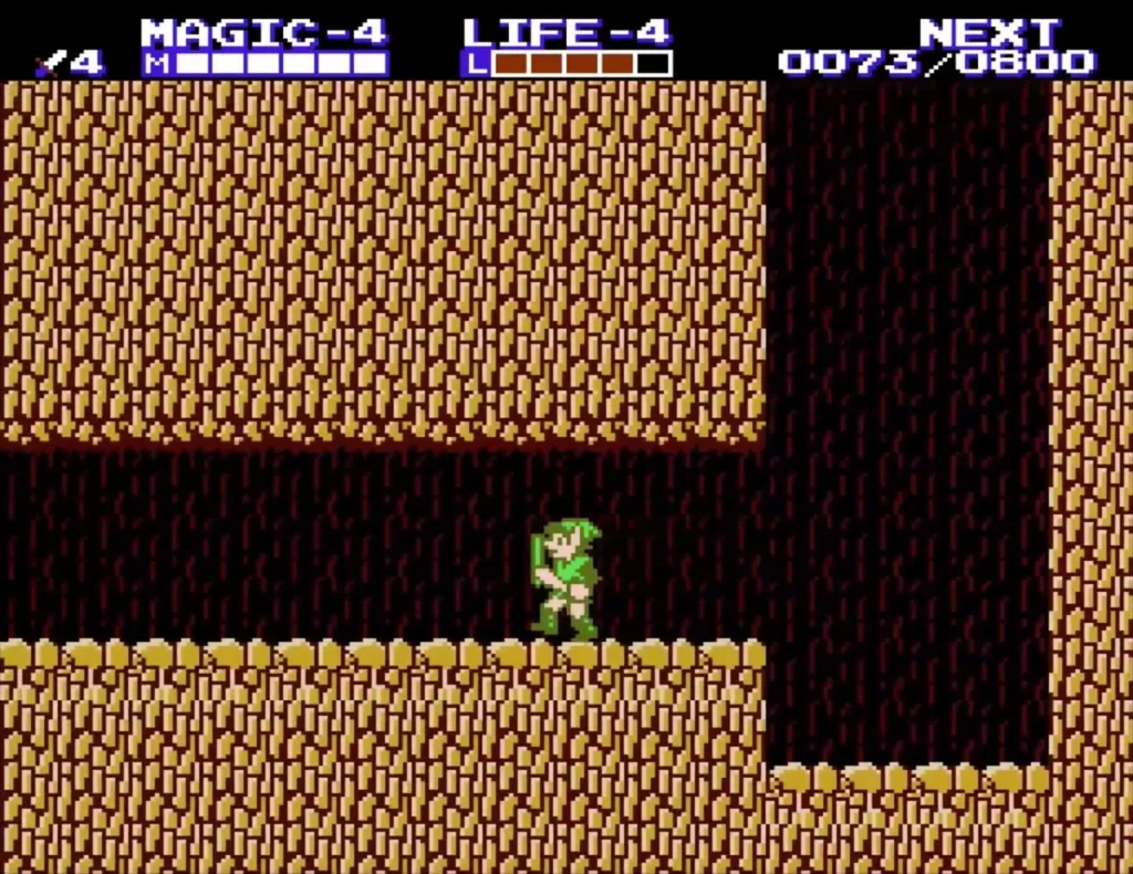 Link on a brown rock ledge with a longer magic bar on the HUD after the pickup