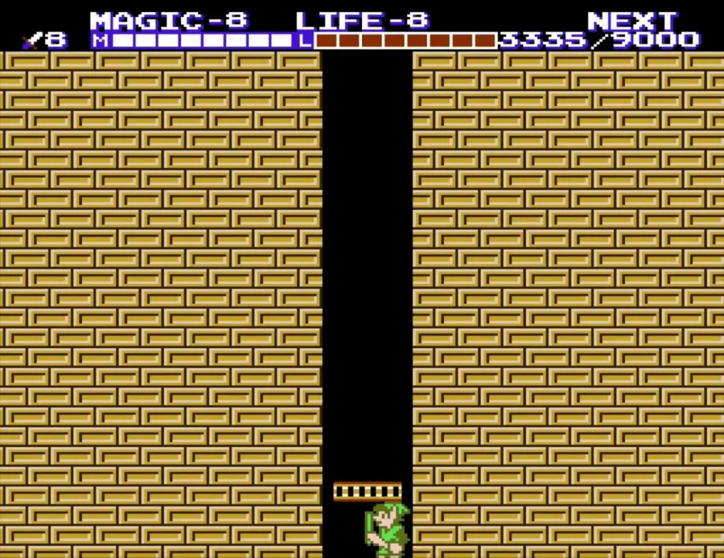 Link at the bottom of the gold-rail elevator shaft