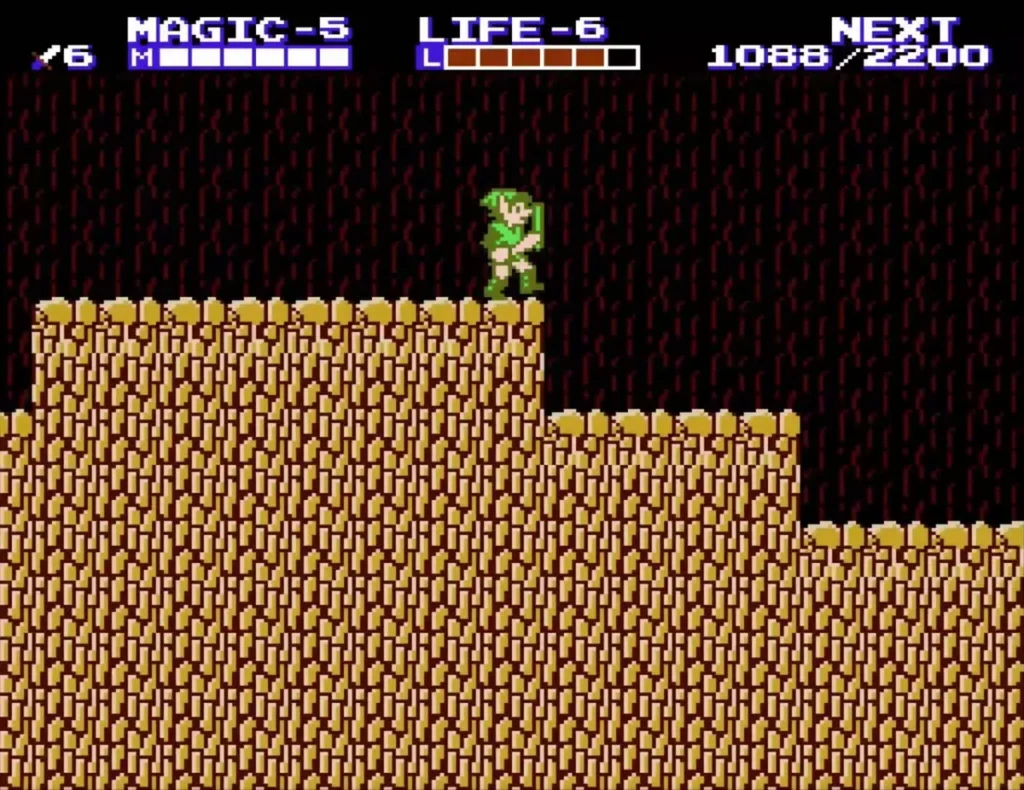 Link on the stepped sandstone ledges inside the cave south of Nabooru