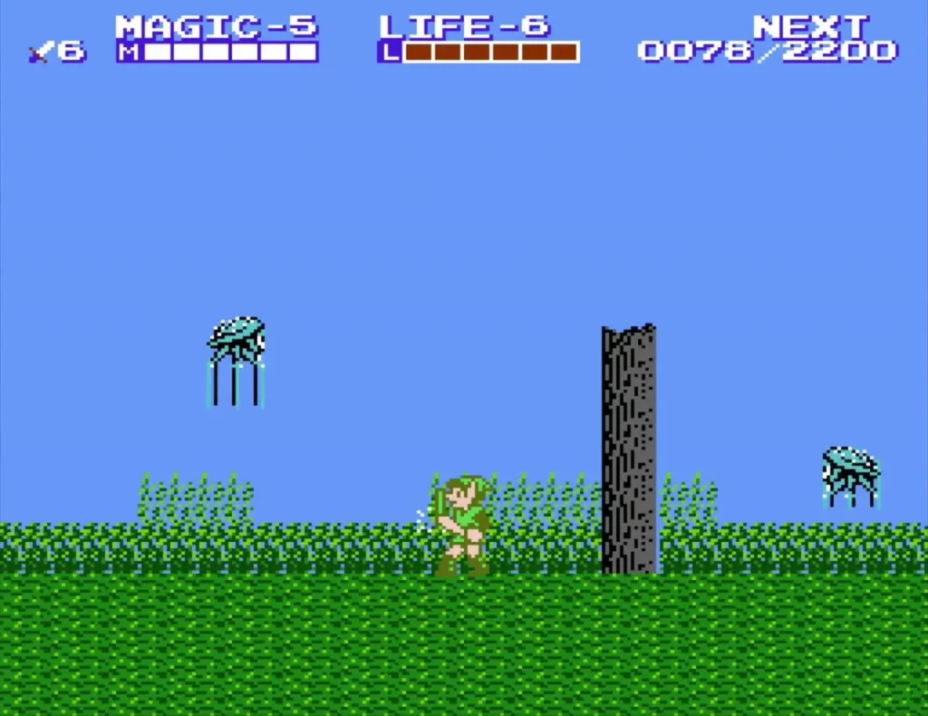 Link in a grassy field with cyan ghosts floating above the grass and grey pillars beside them