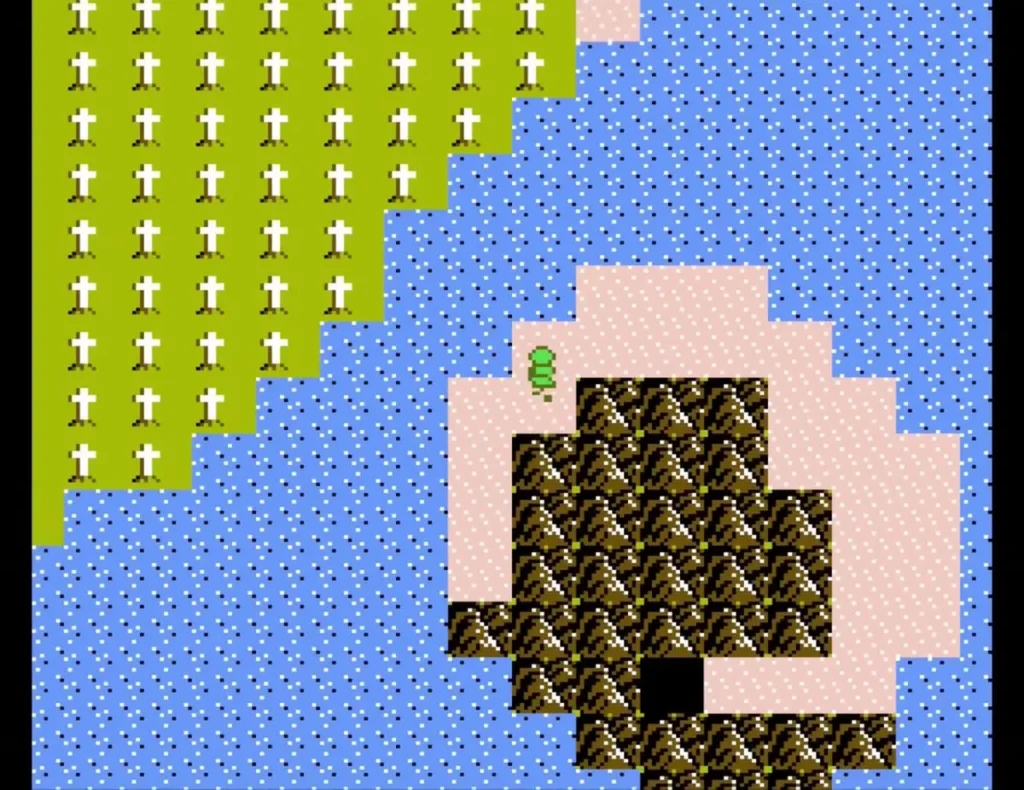 Overhead view of the island surrounded by blue sea, with its cave entrance