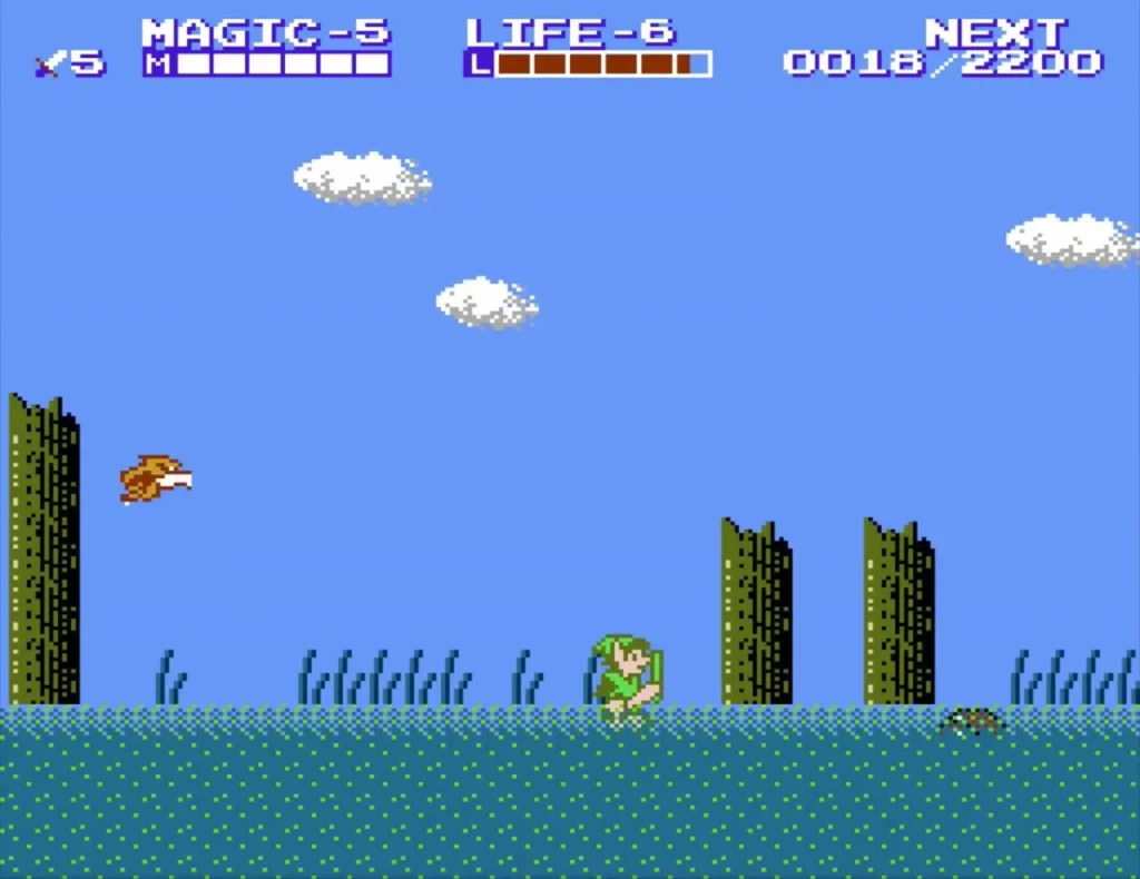 Link on the sea coast beneath a brown bird enemy in flight