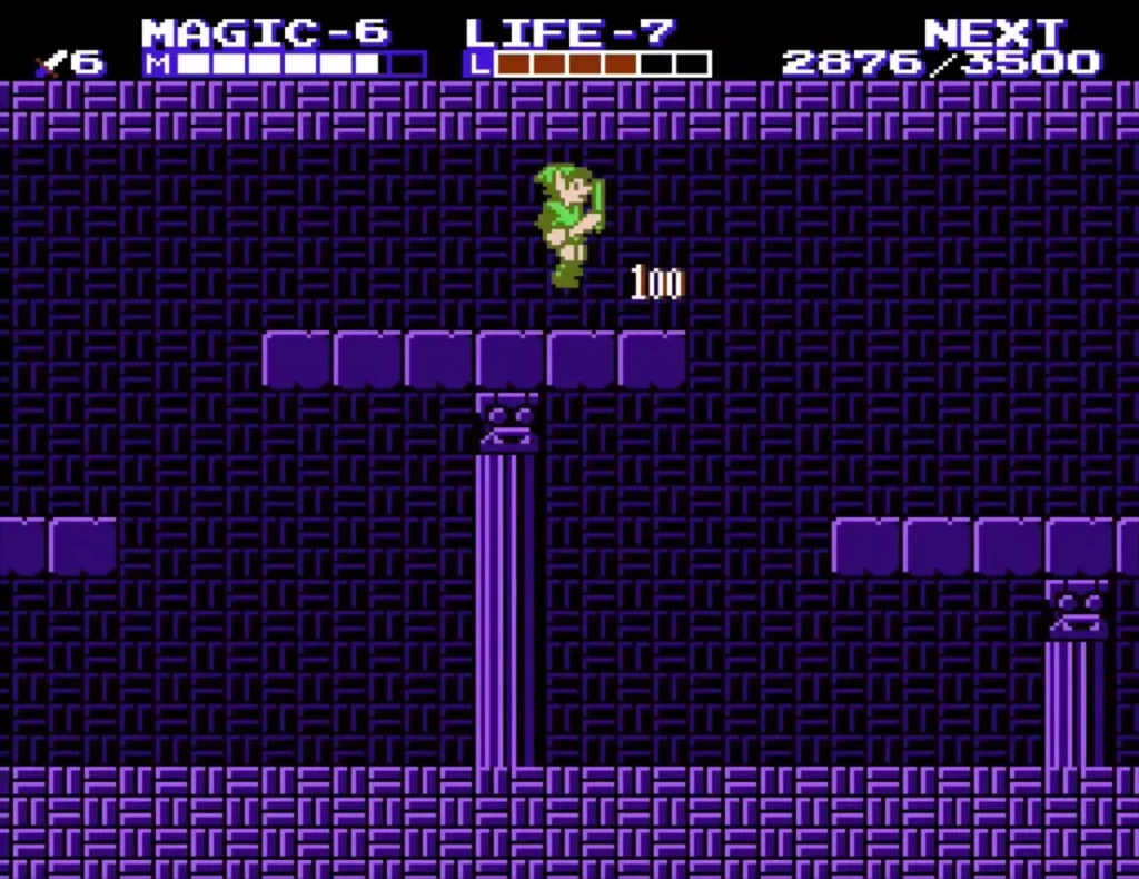 Link leaping up at the ledge in Maze Island Palace after collecting the pouch, with 100 points shown