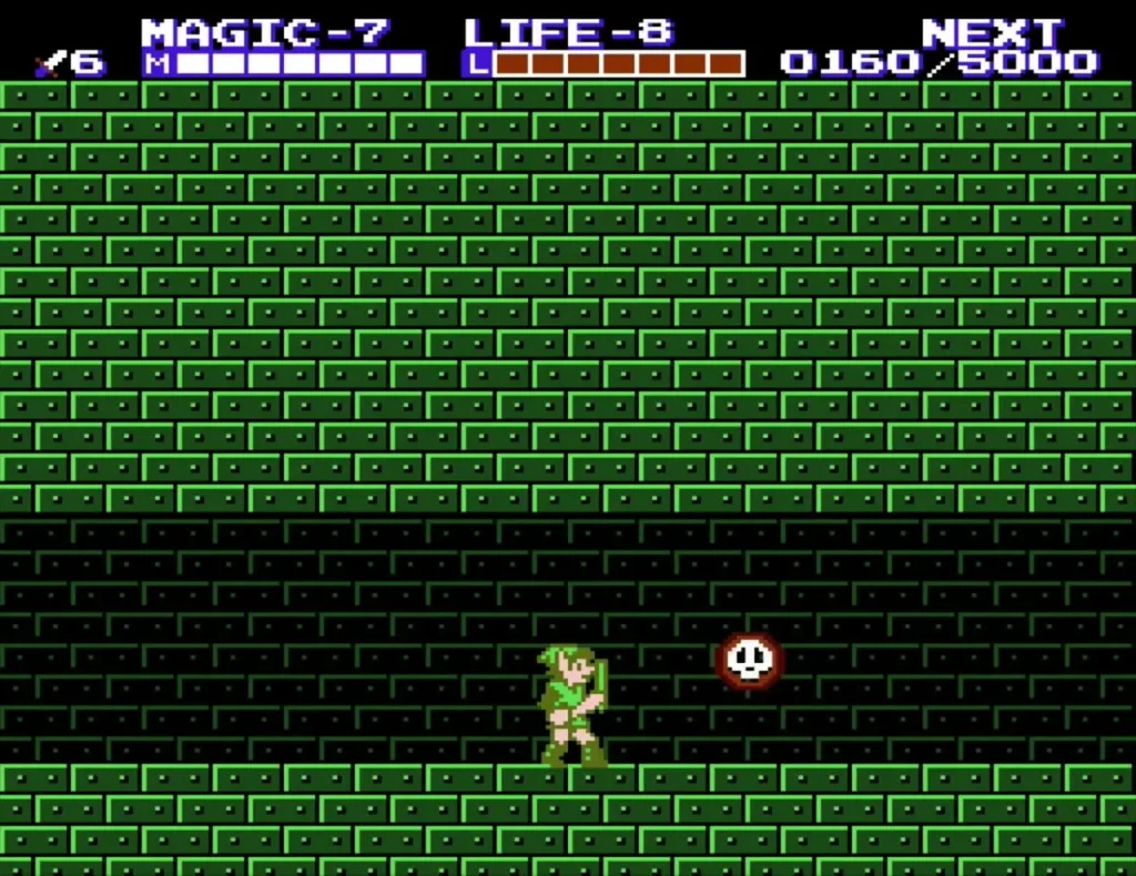 Link facing a red skull-bubble enemy in a green-brick room of Palace on the Sea Link facing a red skull-bubble enemy in a green-brick room of Palace on the Sea
