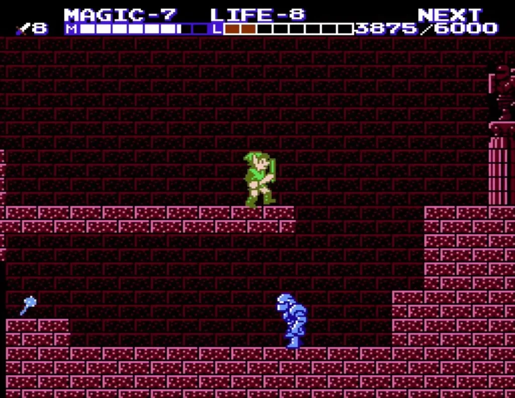 A blue Iron Knuckle on the floor of a brick room as Link stands on a ledge