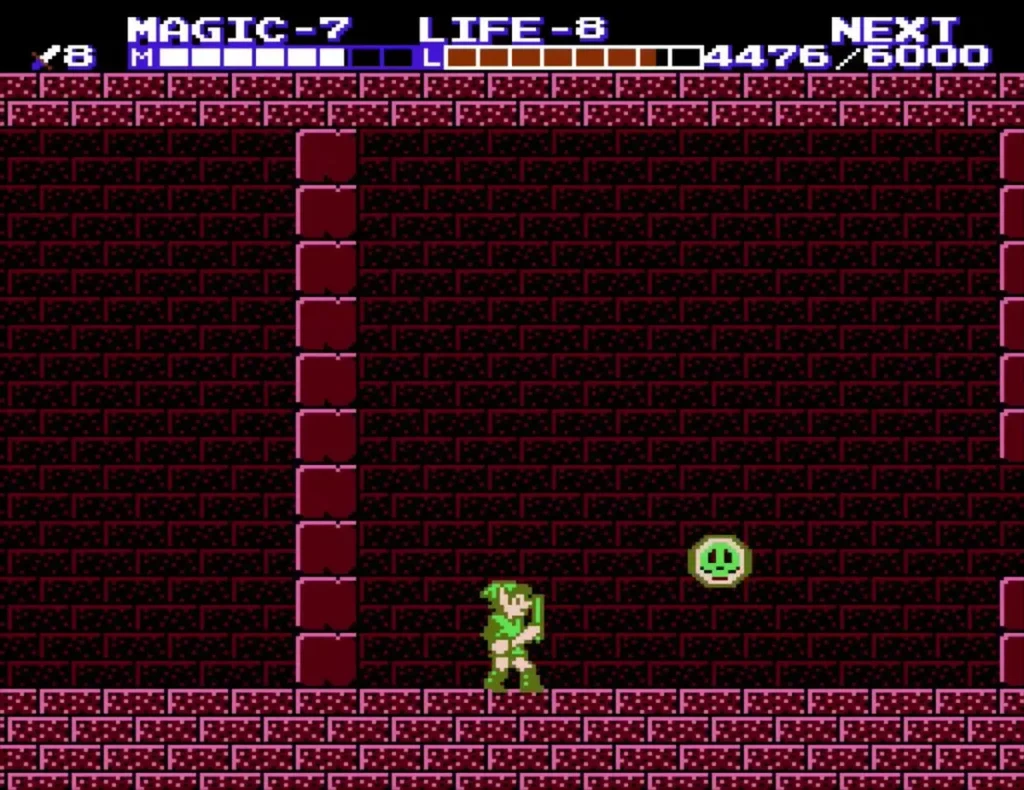 Link beneath a green skull floater in a room of red pillars