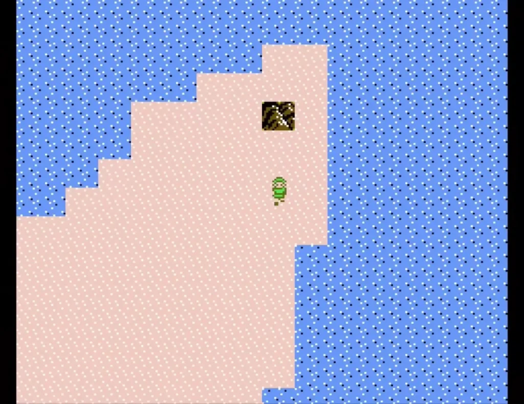 Overworld sea and pink sand with a dark cave entrance on the sand Overworld sea and pink sand with a dark cave entrance on the sand