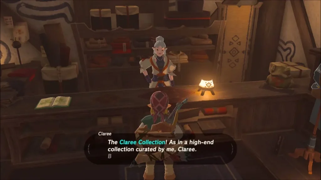 Claree behind the counter of the Enchanted armour shop in Kakariko Village