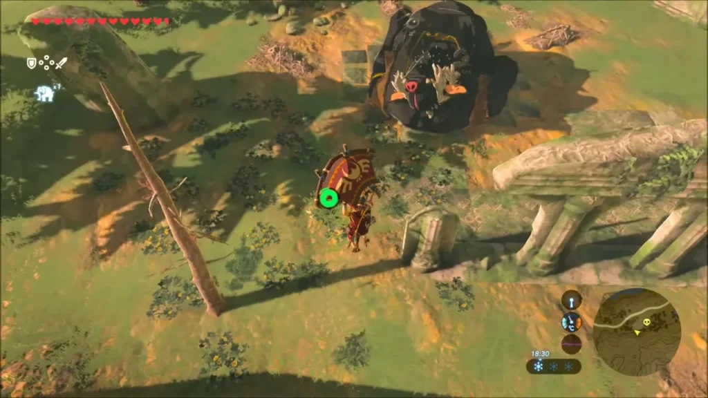 Link approaching the Black Hinox crouched among ruined pillars