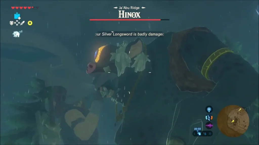 Link swinging a sword at the head of a Hinox beside its glowing eye Link swinging a sword at the head of a Hinox beside its glowing eye