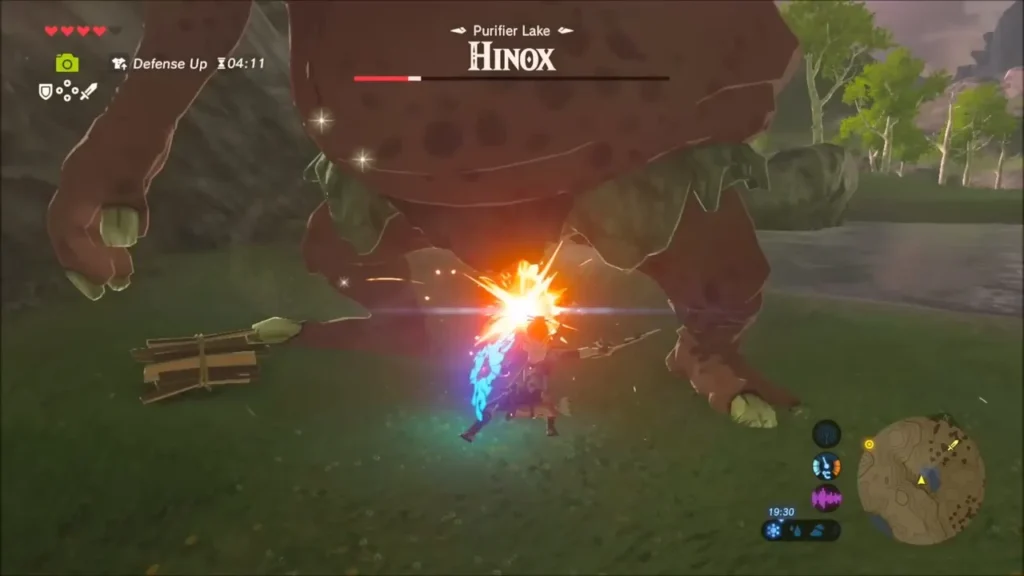 Link's sword hitting a Hinox with a spark burst Link's sword hitting a Hinox with a spark burst