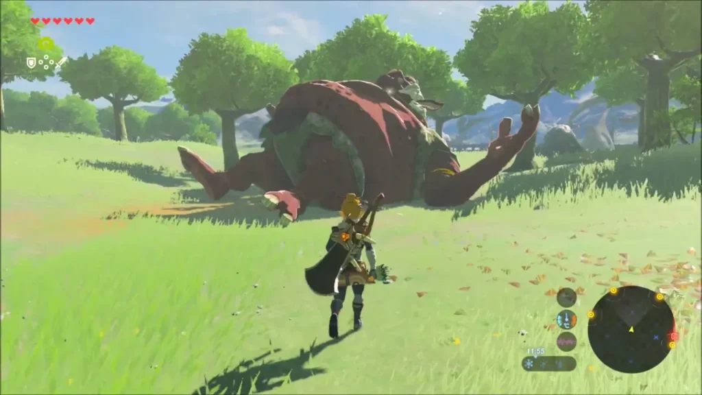 Link approaching a Hinox sleeping on its back in a meadow Link approaching a Hinox sleeping on its back in a meadow