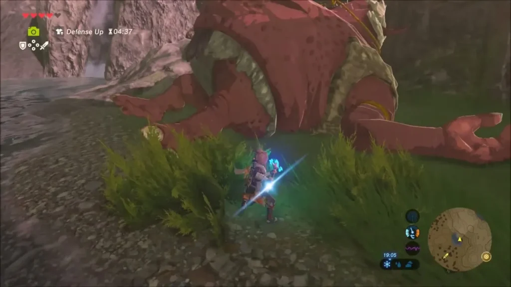 Link sneaking in the grass beside a sleeping Hinox Link sneaking in the grass beside a sleeping Hinox