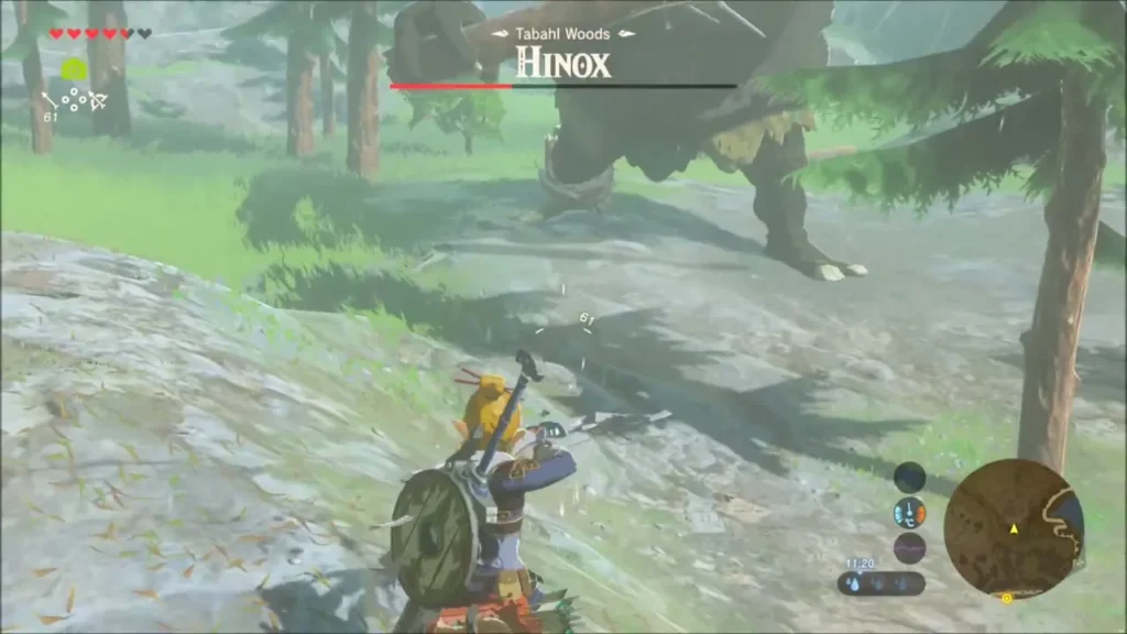 Link aiming his bow at a Hinox carrying a tree Link aiming his bow at a Hinox carrying a tree