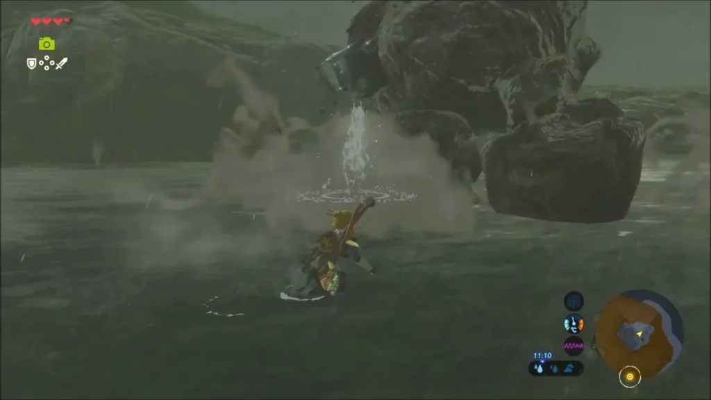 Link dodging beside a Stone Talus arm in a rainy riverbed Link dodging beside a Stone Talus arm in a rainy riverbed
