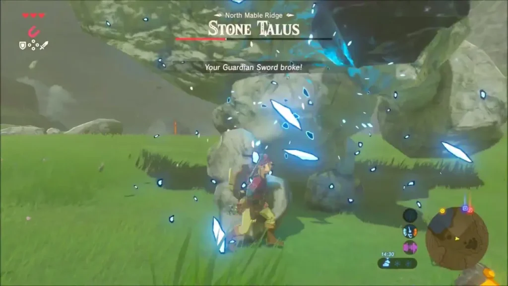 Blue shards burst as Link smashes the Stone Talus and his sword breaks Blue shards burst as Link smashes the Stone Talus and his sword breaks