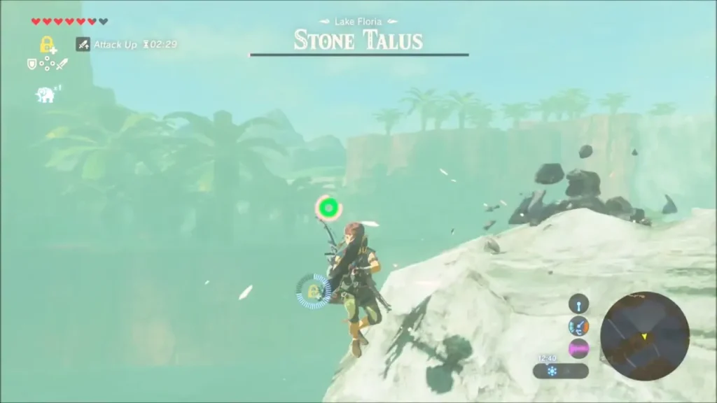 Link swinging at a Stone Talus as rock chunks fly off the broken ore Link swinging at a Stone Talus as rock chunks fly off the broken ore