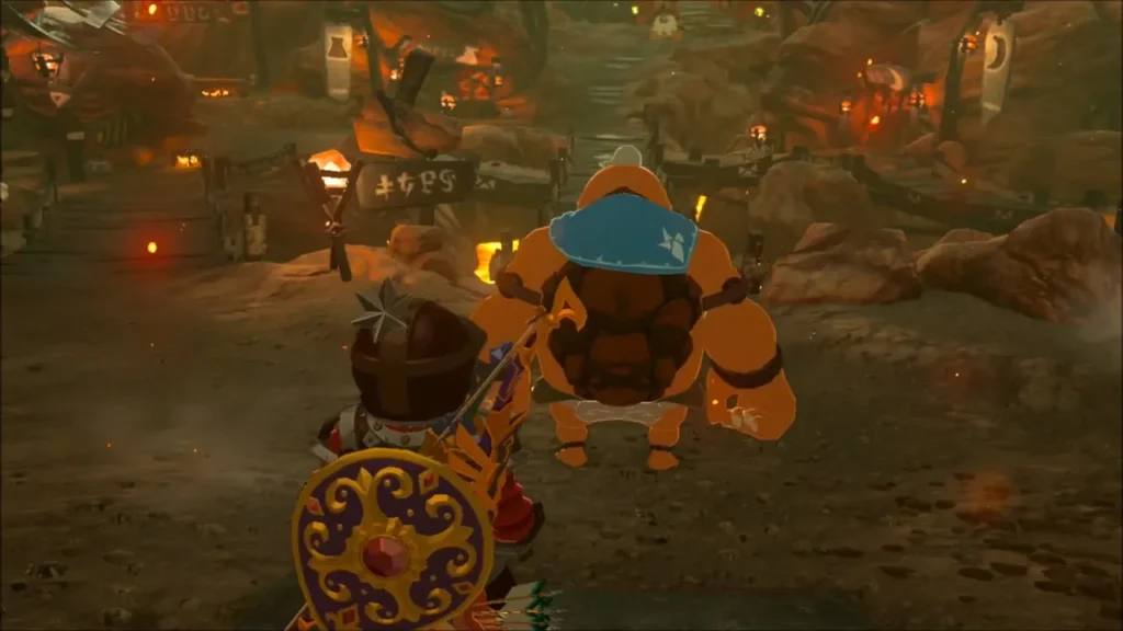 Yunobo hurrying through Goron City with Link behind him Yunobo hurrying through Goron City with Link behind him