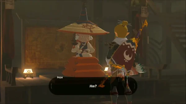 Impa seated on her cushion in her Kakariko house as Link approaches Impa seated on her cushion in her Kakariko house as Link approaches