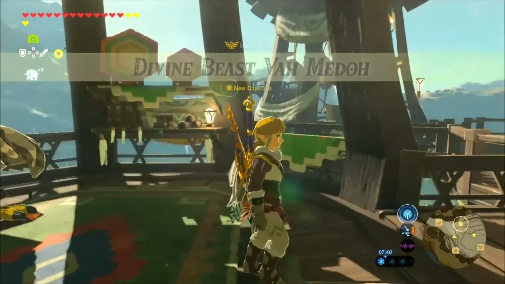 Quest banner for Divine Beast Vah Medoh as Link stands in Rito Village Quest banner for Divine Beast Vah Medoh as Link stands in Rito Village