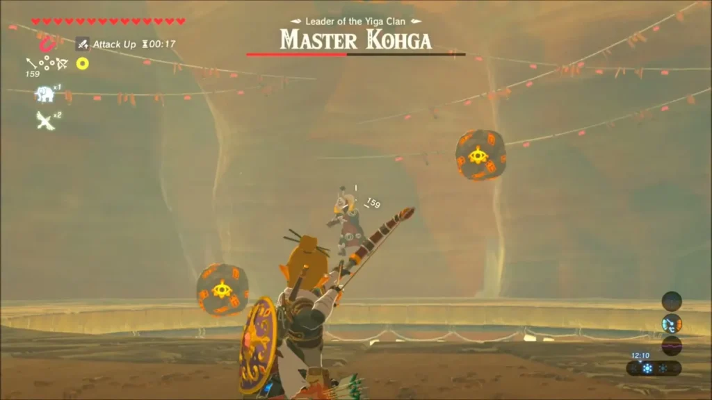 Link with bow drawn on Kohga while two stone spheres circle him Link with bow drawn on Kohga while two stone spheres circle him