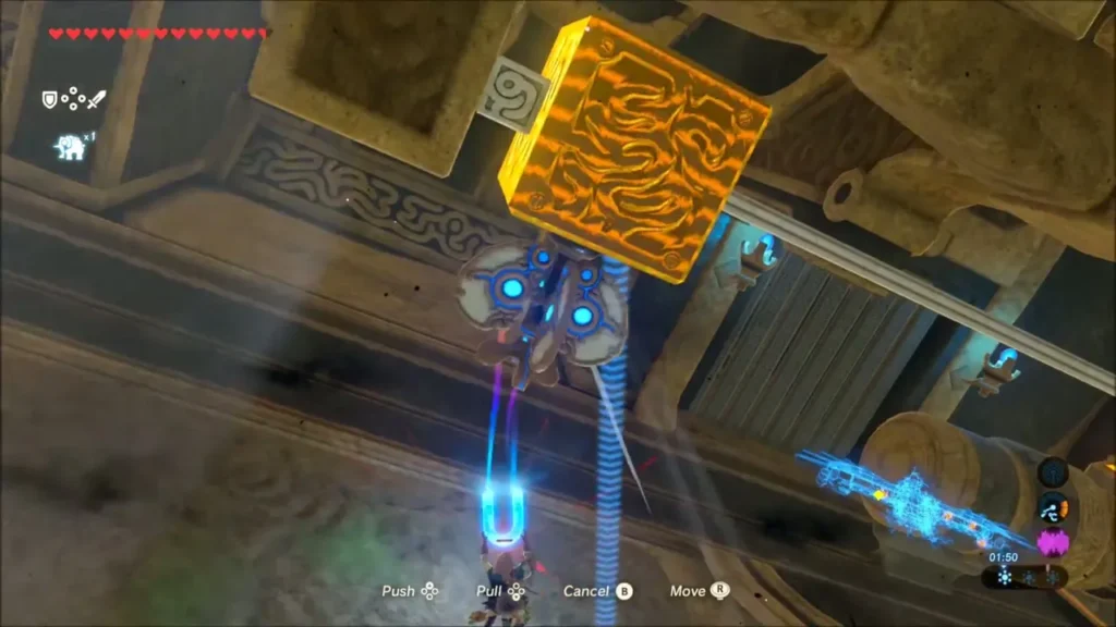 Link pulling a gold-glowing metal block with Magnesis in Vah Medoh Link pulling a gold-glowing metal block with Magnesis in Vah Medoh