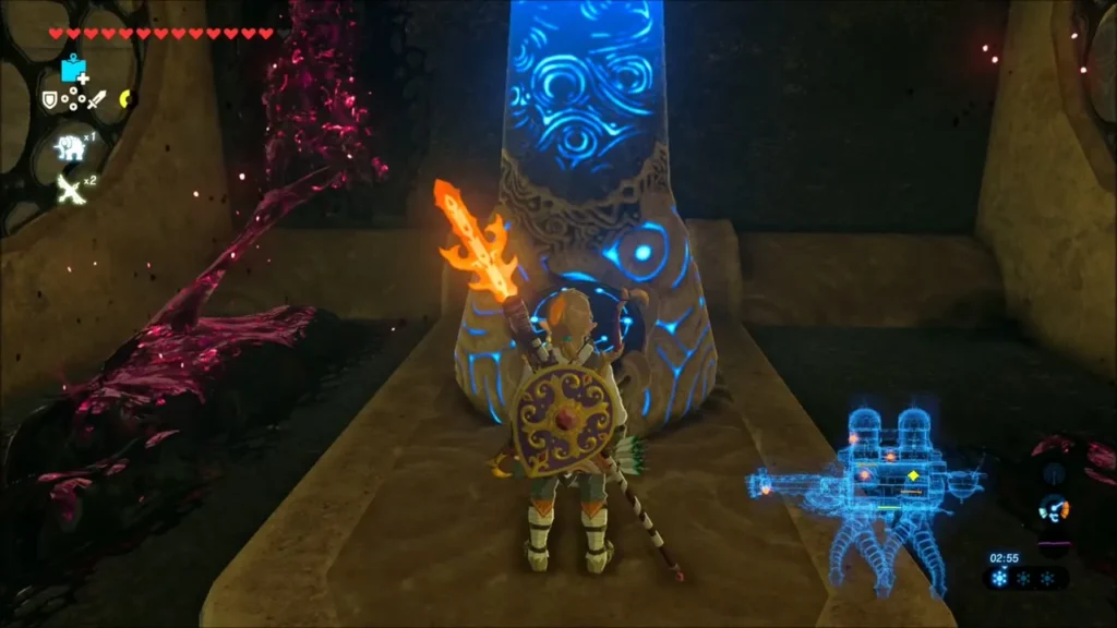 Link touching a glowing blue pillar inside the Divine Beast Link touching a glowing blue pillar inside the Divine Beast