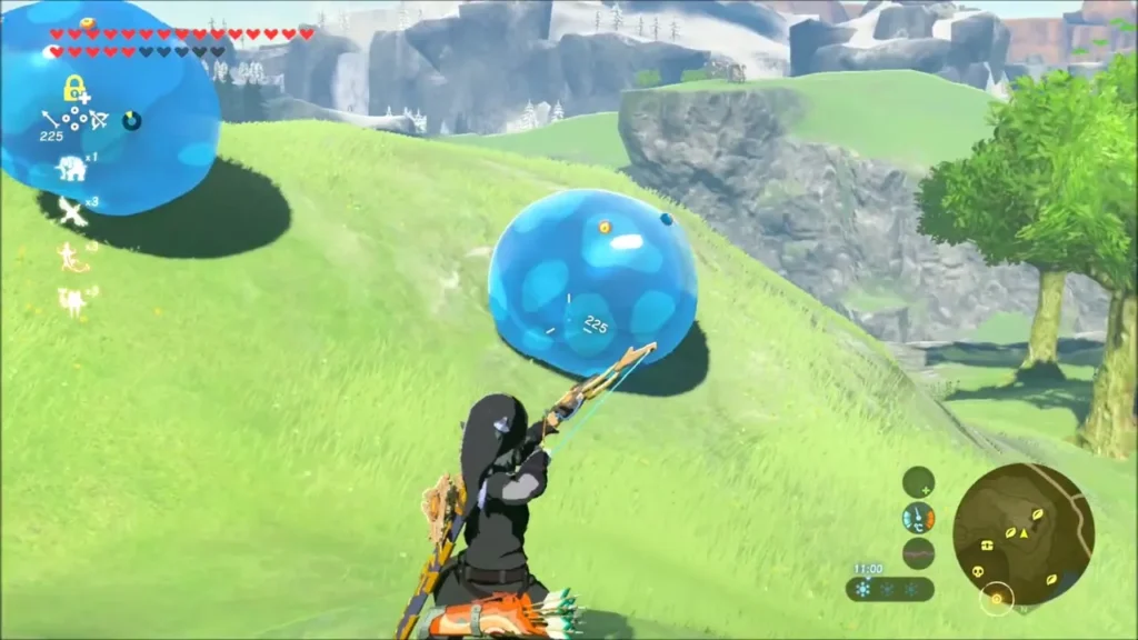Link aiming his bow at a large blue Chuchu on a grassy hillside Link aiming his bow at a large blue Chuchu on a grassy hillside