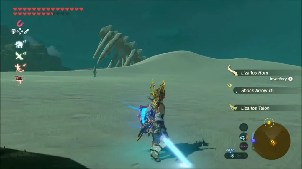 Link in the desert after the fight, with Lizalfos Horn, Talon and Shock Arrow drops listed Link in the desert after the fight, with Lizalfos Horn, Talon and Shock Arrow drops listed