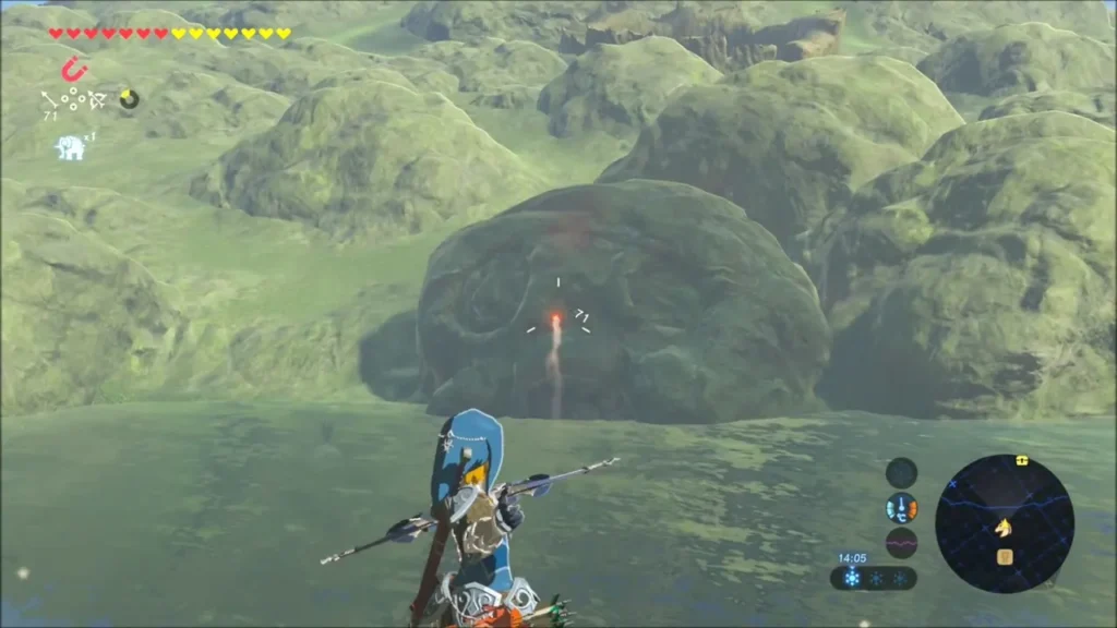 Link fires an arrow from range at the boulder where the Octorok hides Link fires an arrow from range at the boulder where the Octorok hides