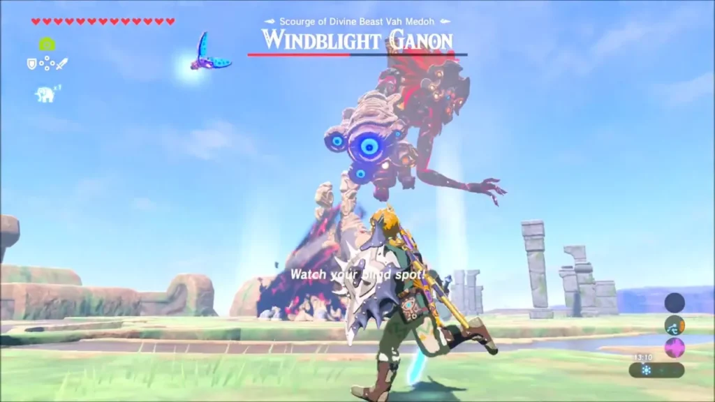 Link running from Windblight Ganon as his glowing arm turns on him Link running from Windblight Ganon as his glowing arm turns on him