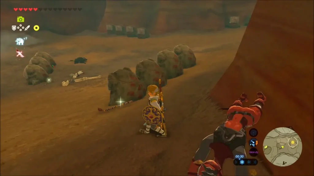 Link crouching behind Yiga statues as an enemy lies nearby Link crouching behind Yiga statues as an enemy lies nearby