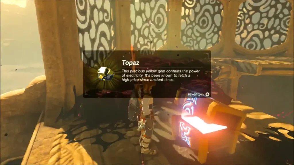 Link collecting a Topaz from a chest in Vah Naboris Link collecting a Topaz from a chest in Vah Naboris