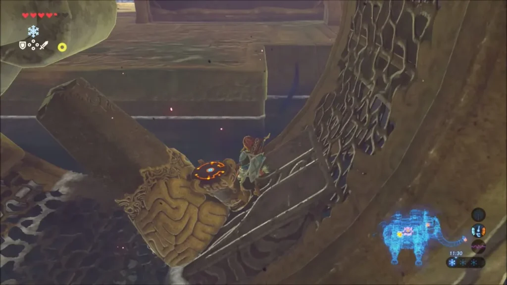 Link climbing a turning water wheel past a terminal mounted on it Link climbing a turning water wheel past a terminal mounted on it