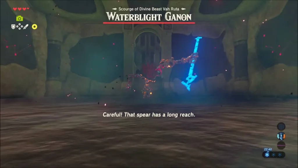 Waterblight Ganon wielding a long glowing spear in the flooded main room Waterblight Ganon wielding a long glowing spear in the flooded main room