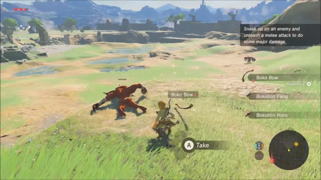 Link standing over a defeated Bokoblin on a grassy hillside with the plateau ruins beyond Link standing over a defeated Bokoblin on a grassy hillside with the plateau ruins beyond