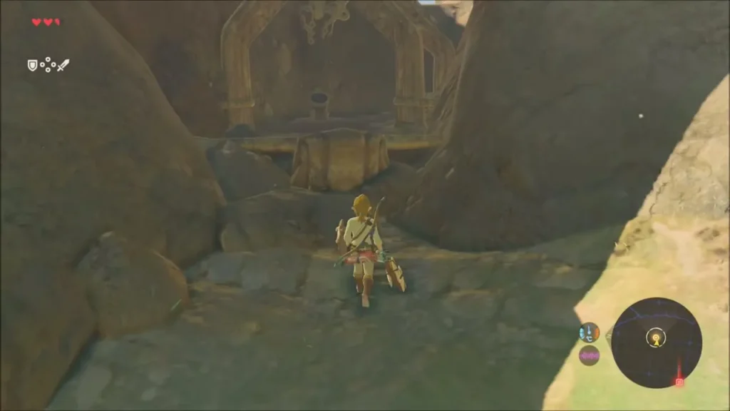 Link climbing toward a boulder-choked stone doorway where the tower is buried Link climbing toward a boulder-choked stone doorway where the tower is buried