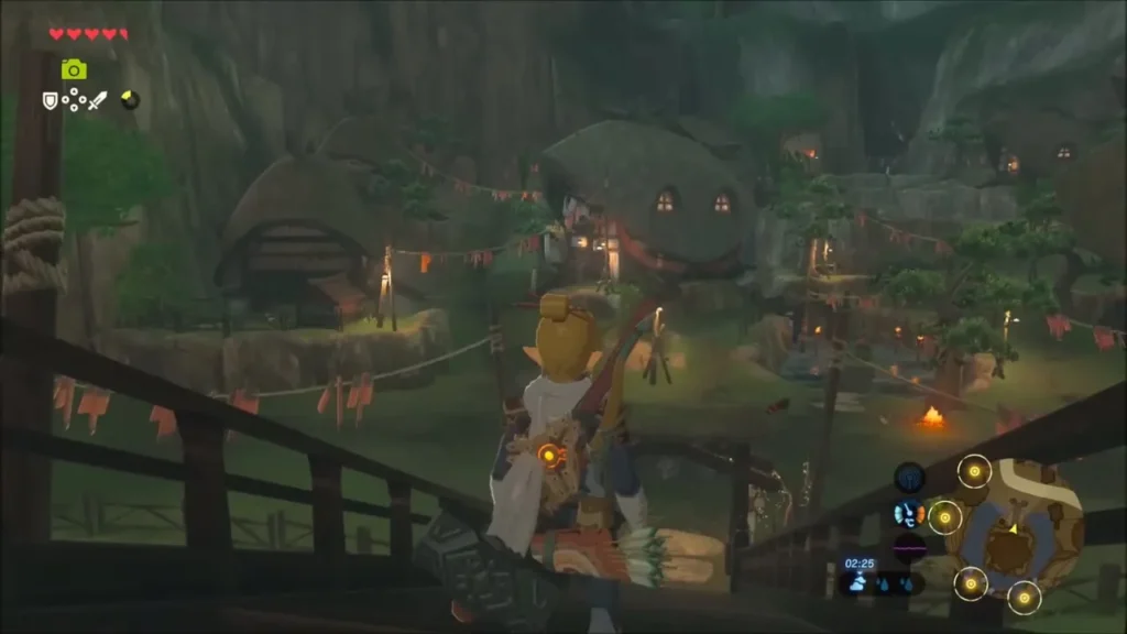 Link leaving Kakariko Village over the lantern-lit wooden bridge Link leaving Kakariko Village over the lantern-lit wooden bridge