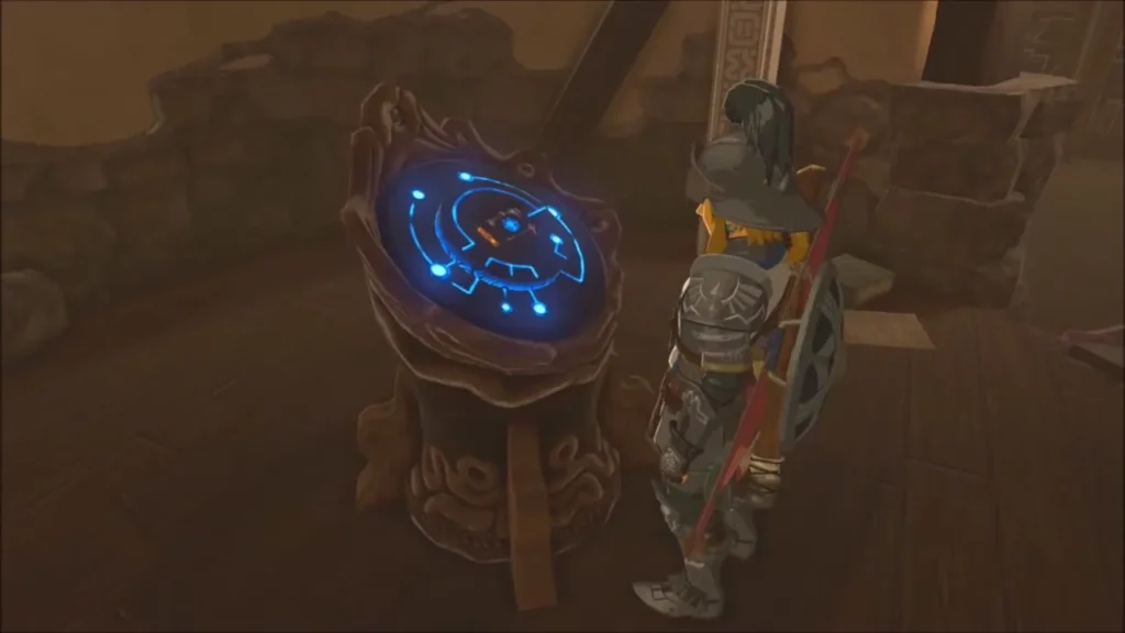 The restored Sheikah Slate glowing blue on its pedestal The restored Sheikah Slate glowing blue on its pedestal