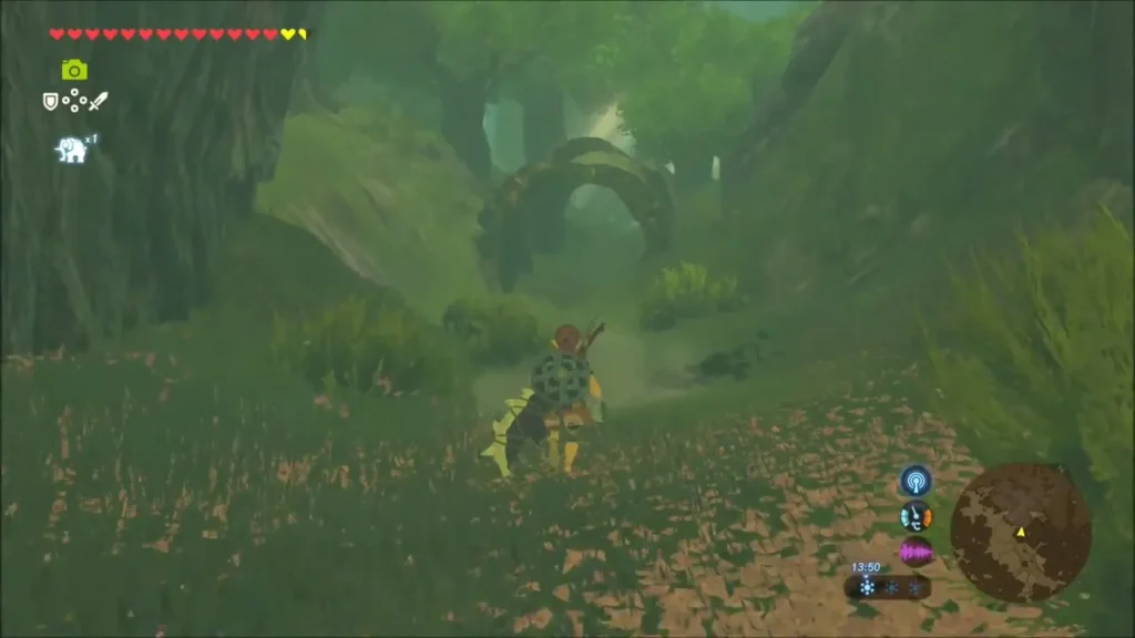 Link on the dirt path approaching a stone arch in Korok Forest Link on the dirt path approaching a stone arch in Korok Forest