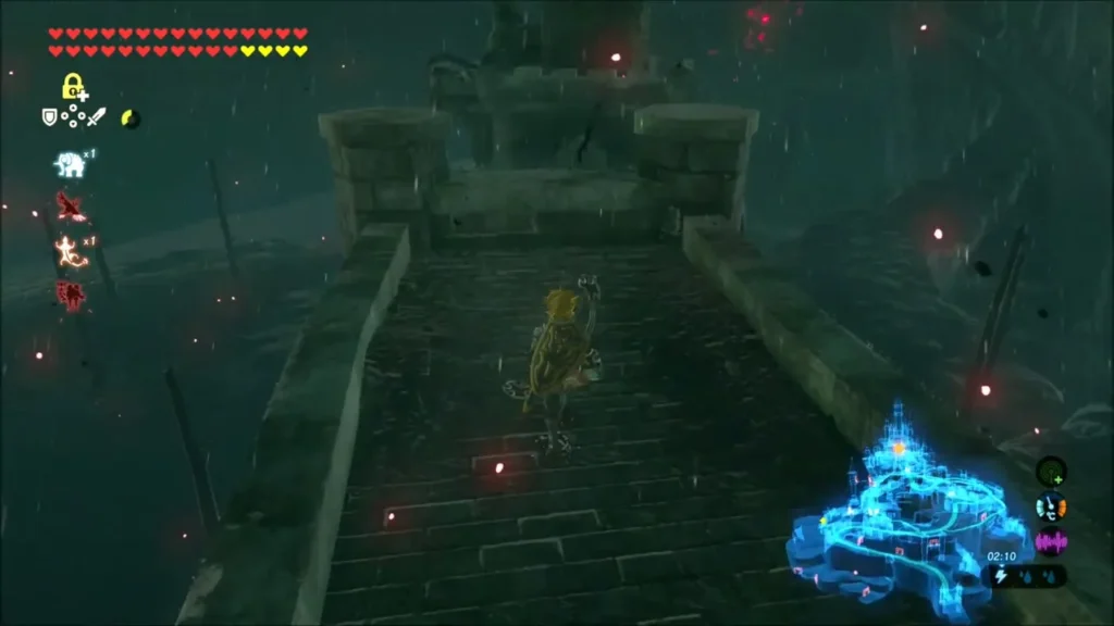Link crossing a dark stone walkway toward Hyrule Castle in the red-tinged storm Link crossing a dark stone walkway toward Hyrule Castle in the red-tinged storm